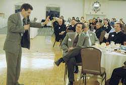 Dr. Ray Guarendi uses humor to deliver parenting advice during a ­presentation at the fourth annual Catholic Radio Indy dinner on March 27 at the Riverwalk Banquet Center in Indianapolis. Guarendi is the co-host of the nationally syndicated show “The Doctor Is In” broadcast on Catholic radio stations from coast to coast and from 1 p.m. to 2 p.m. on Tuesday, Wednesday and Thursday on Catholic Radio Indy 89.1 FM. (Photo by Sean Gallagher) 